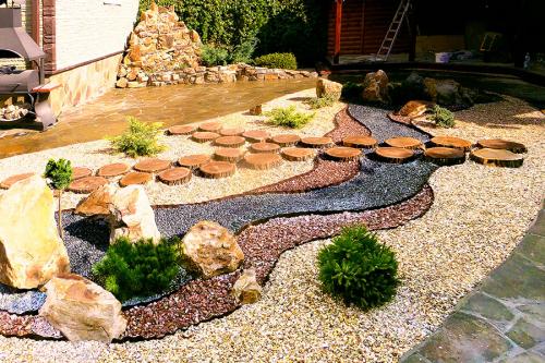 Декоративный камень на клумбу. Виды дизайнерских решений 13 Декоративный камень на клумбу. Виды дизайнерских решений 13