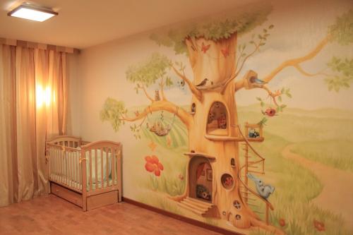 Оформление стены над кроватью в детской. Особенности росписи стен или как выбрать рисунок