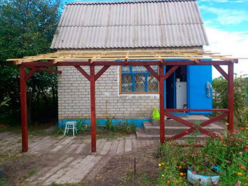 Навес к дому из шифера. Навес на даче своими руками: пошаговое строительство