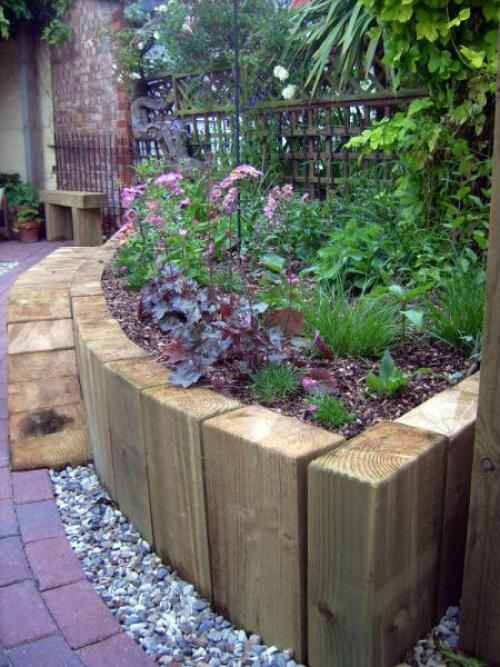 Декор для клумбы из дерева. Ограждение для клумб и грядок из дерева – красота с природным началом (более 70 фото)