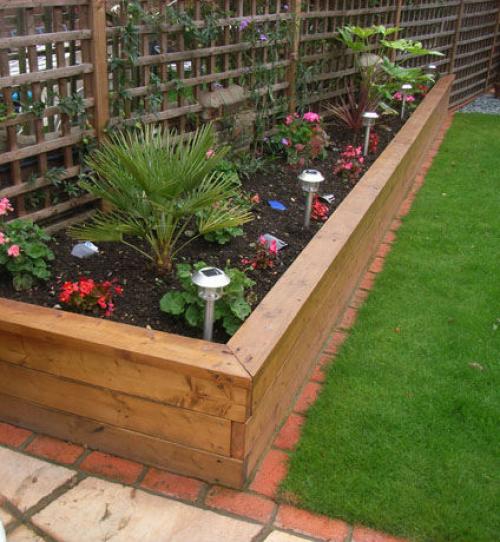 Декор для клумбы из дерева. Ограждение для клумб и грядок из дерева – красота с природным началом (более 70 фото)