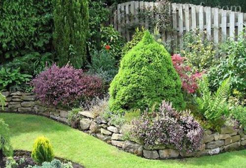 Клумбы с камнями и цветами своими руками. Клумба из камней – пошаговое создание и оформление клумбы. Самые актуальные и стильные идеи создания клумбы (125 фото и видео) 15