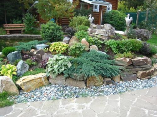 Клумбы с камнями и цветами своими руками. Клумба из камней – пошаговое создание и оформление клумбы. Самые актуальные и стильные идеи создания клумбы (125 фото и видео) 11