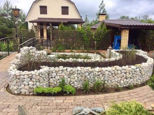 Как сделать клумбу из камней. Разновидности